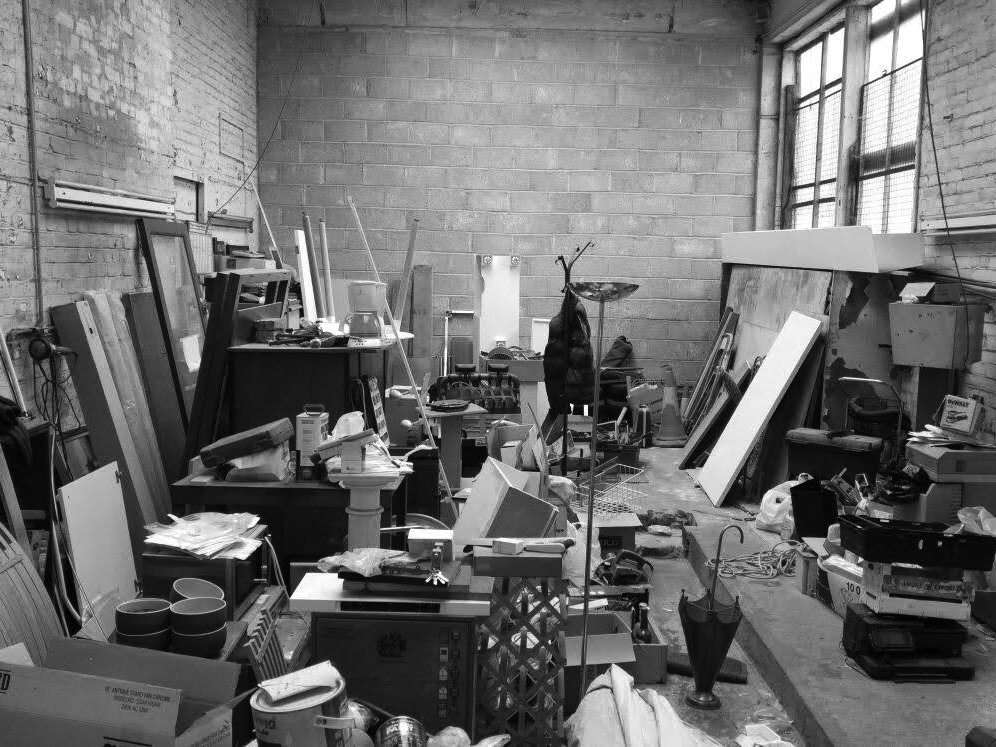 The building before renovation - cluttered interior